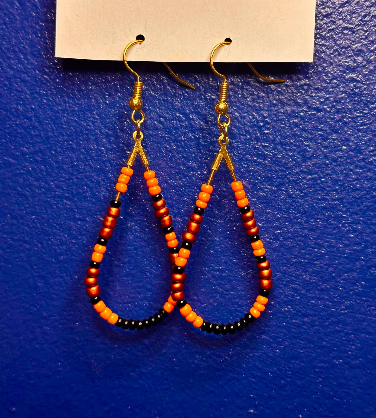 Gold Teardrop Dangle with Variety Orange and Black Beads