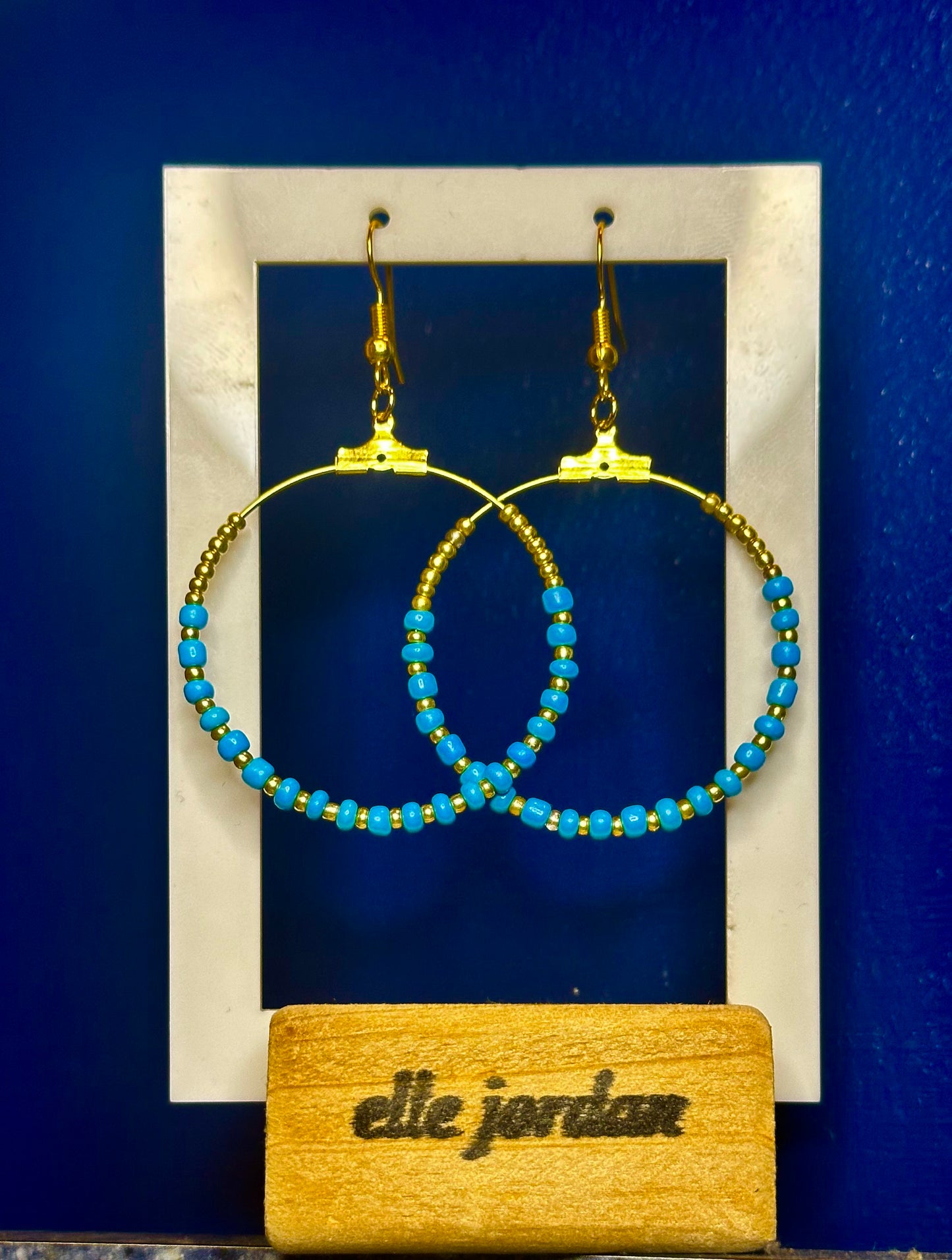Large Gold Circle Dangle with Gold and Baby Blue Beads