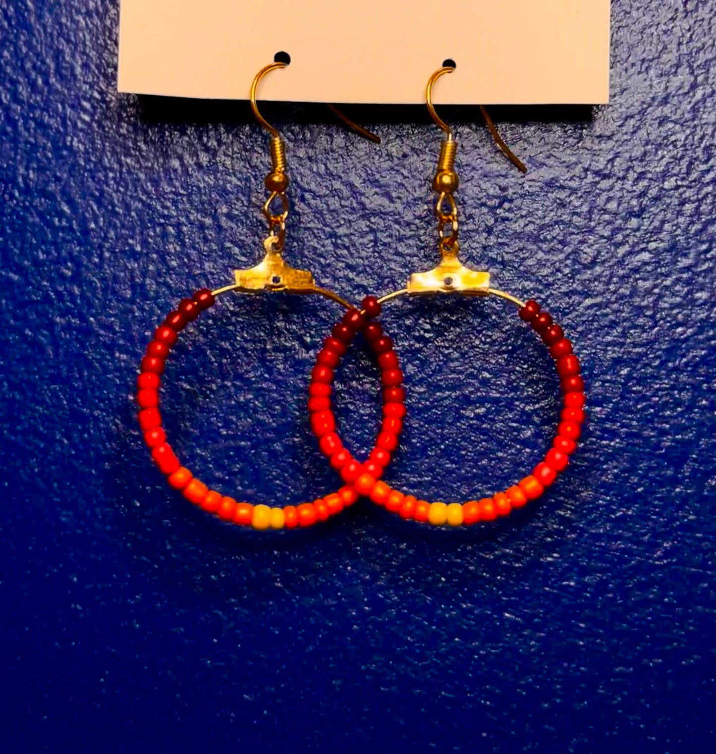 Gold Circle Dangle with Red and Orange Hombre Beads