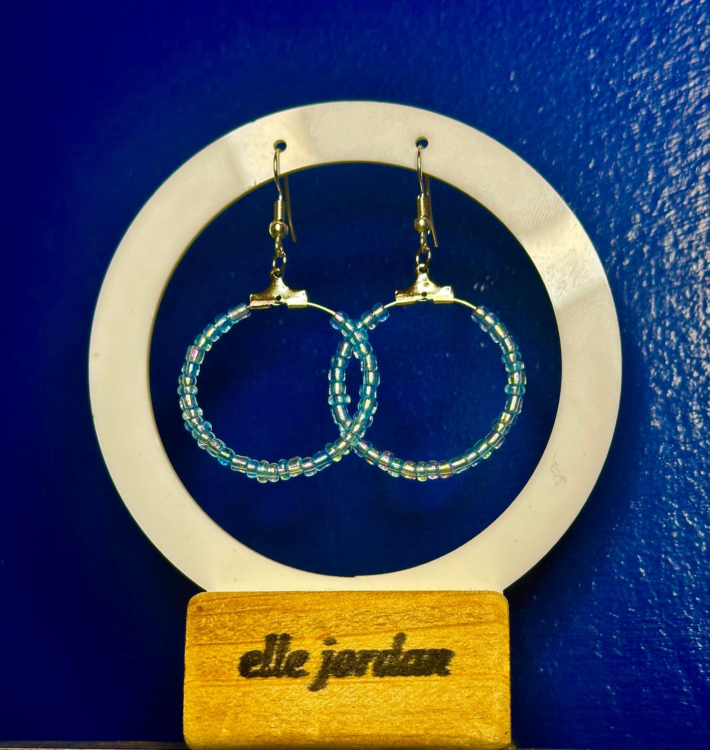 Silver Circle Dangle with Light Blue Glass Beads